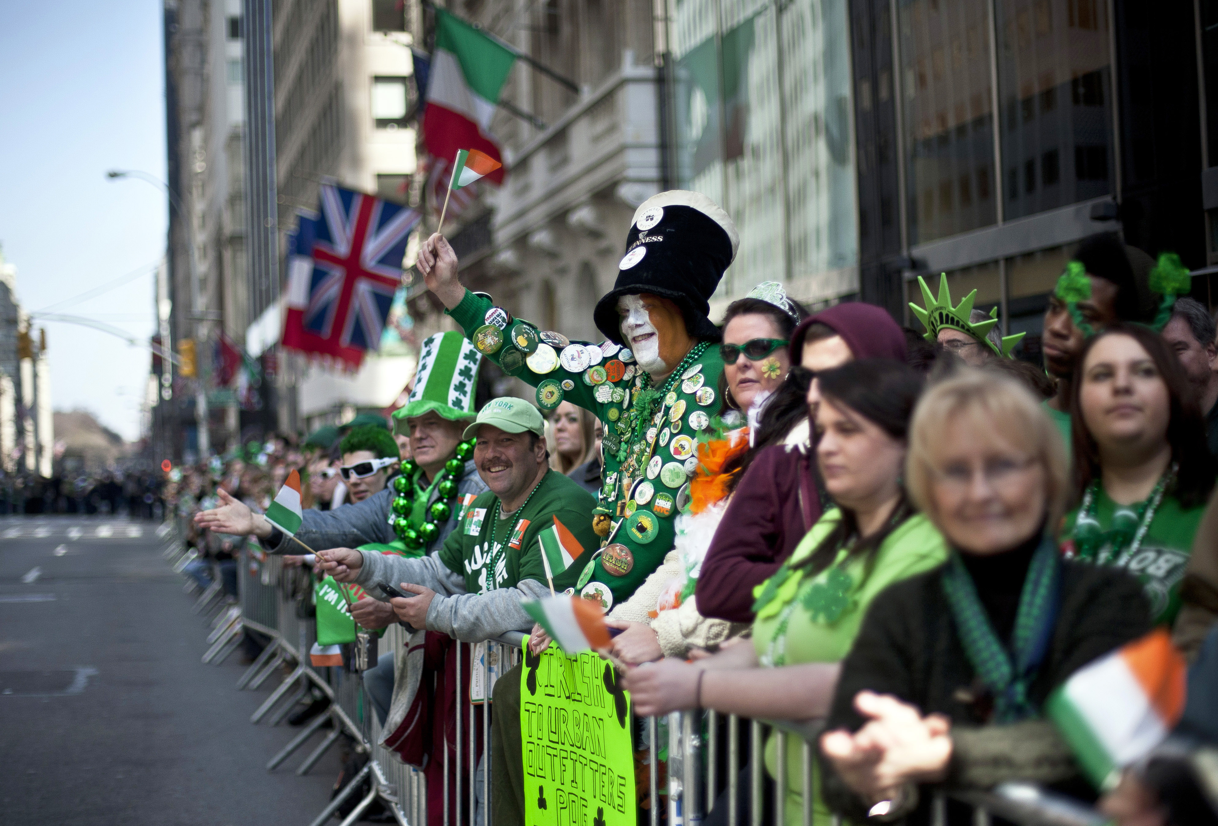 NEW YORK, NY - MARCH 17: Revelers cheer on the marchers during the 251st annual St. Patrick's Day Parade March 17, 2012 in New York City. The parade honors the patron saint of Ireland and was held for the first time in New York on March 17, 1762, 14 years before the signing of the Declaration of Independence. (Photo by Allison Joyce/Getty Images)