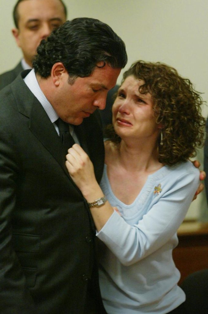 Attorney consoles Melanie after being sentenced to over 30 years in prison Photo: nydailynews