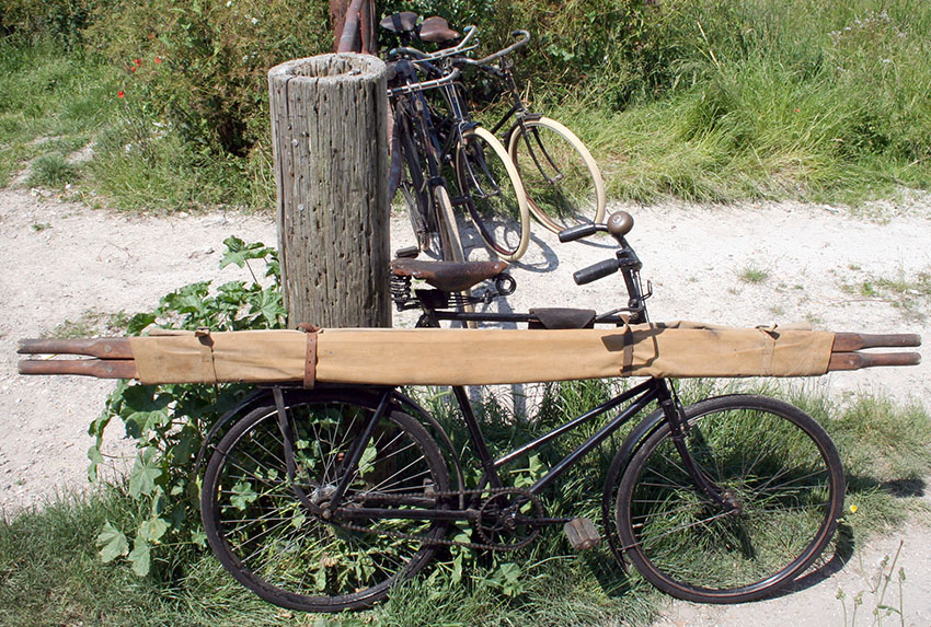 Stretcher rolled up and attached to a single bike Photo: oldbike
