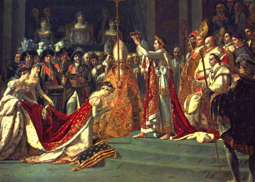 Joséphine kneels before Napoléon at their coronation. Source: youtube.com